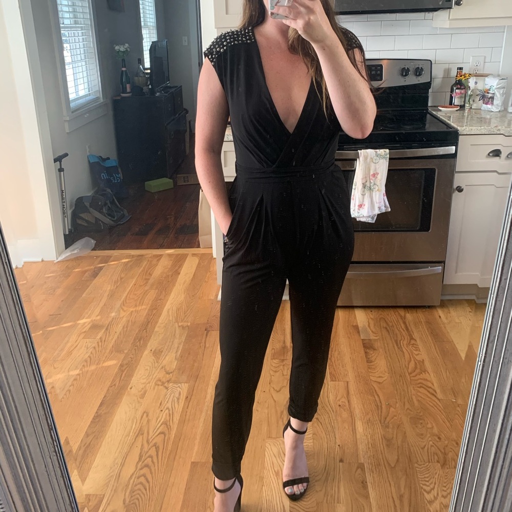 bebe black studded slip on jumpsuit